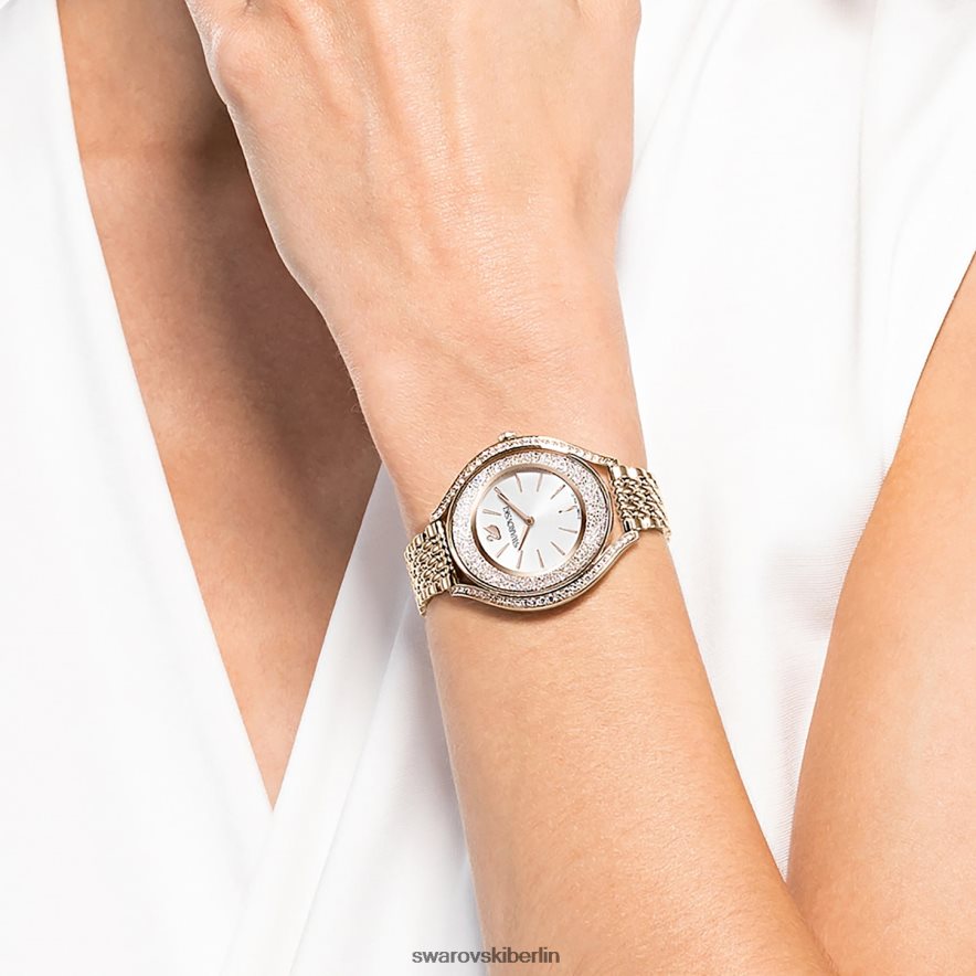 Swarovski Uhr mit kristalliner Aura Swiss Made, Metallarmband, goldfarben, champagnergoldfarbenes Finish Zubehör HLT4481138